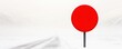 © Mnt - A striking red sign stands alone in a snowy landscape, symbolizing caution and isolation in a serene yet desolate environment.