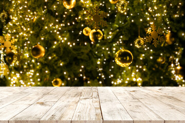 Wall Mural - christmas tree background with empty wooden deck table. empty display for product montage design.