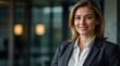 © VistaVisions - Headshot portrait of a smart, intelligent, friendly, likable executive business woman manager, advisor, banker agent, representative in suit