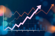 © Tetlak - Abstract financial chart with upward arrows and bokeh effect.