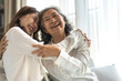 © Art_Photo - Portrait of enjoy happy love asian family senior mature mother and young daughter smiling play laughing and having fun together at home, care, elderly, insurance.happy family and Mother Day concept