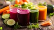 © K9 STUDIOS - A vibrant selection of fresh vegetable juices in glasses, showcasing an array of colors from beets, greens, and carrots, with a rustic wooden background.