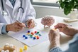 © Natchanok - Neurologist conducts cognitive test with elderly patient to assess mental functioning