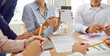 © Studio Romantic - Business people sitting at desk on workplace on meeting discussing finance growth. Company employees analyzing data stat and financial report with brainstorming. Teamwork and cooperation concept.