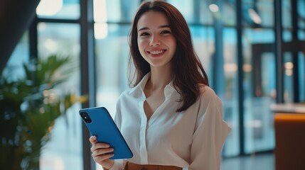 Wall Mural - The Smiling Woman with Smartphone