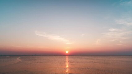 Wall Mural - sunrise over the sea timelapse.