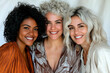 © Enrique - 3 happy naturally beautiful women of different races, one african american, one hispanic and one caucasian, dressed in brown and white tones