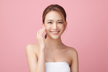 Beautiful young asian woman with clean fresh skin on pink background, Face care, Facial treatment, Cosmetology, beauty and spa, Asian women portrait.