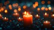 © paper later - A Single Lit Candle Amidst a Field of Blurred Candles and Bokeh Lights