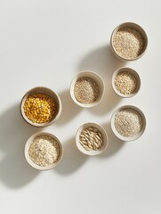 Poster - Various grains including oats, rice, and corn are artistically displayed in stylish bowls against a clean white backdrop. Generative AI