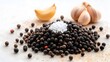 © NKCoolper - Close up high detailed image of a vibrant heap of black peppercorns with a sprinkle of salt on a solid color background  The image showcases the texture aroma