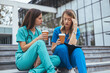 © Dragana Gordic - Two Nurses Taking a Break With Coffee Outside Hospital