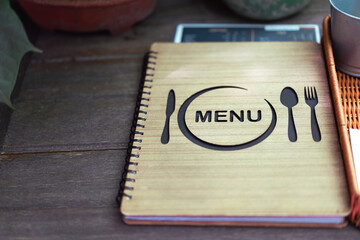 Food menu on wooden table for restaurant or coffee shop