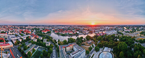 Wall Mural - Aerial view of Wroclaw old town with the Cathedral of st. John the Baptist and colorful buildings over Odra river at sunset