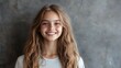 © Настя Шевчук - Portrait of smiling teenage girl on grey background