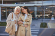 © Dragana Gordic - Happy Grandmother and Granddaughter Smiling Together Outdoors