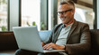 © halo - businessman working on laptop