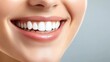 © Алена Ваторина - Close-up of a woman's bright, healthy smile with perfectly aligned white teeth and smooth skin