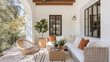 © VERTEX SPACE - A cozy outdoor living space featuring stylish sofa with orange cushions, wicker chair, and coffee table adorned with plants. serene atmosphere invites relaxation and enjoyment