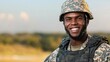 © Arush - Smiling soldier in military uniform, confident pose, standing outdoors, blurred background of nature and sky, showcasing bravery and pride.