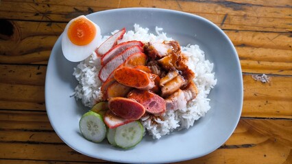 Poster - Red pork and crispy pork on rice, food in Thailand.