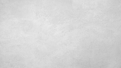 Poster - A grey wall with a rough texture. The wall is covered in white paint and has a grainy appearance