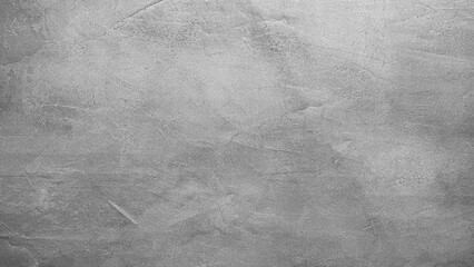 Poster - A grey wall with a rough texture. The wall is covered in white paint and has a grainy appearance