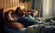 © Varitnan - A man is sleeping in bed with a pillow and blanket