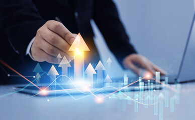 Leinwandbilder - Business growth graph chart. Businessman using tablet analyzing sales data and financial report.Financial marketing graph grow chart. Arrow up with graph corporate future growth plan.