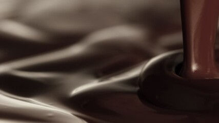 Poster - Super Slow Motion of Pouring Hot Melted Chocolate, Creating Waves Shapes, Filmed on High Speed Cinema Camera, 1000 fps. Camera in Motion. Extreme Macro Shot.
