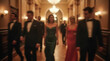© Dmytriy - Blurred image of men in tuxedos and women in exquisite dresses in the theatre hall at a premiere