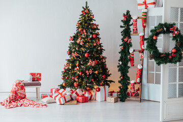 Wall Mural - Interior with Christmas tree with gifts and toys as background New Year