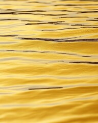 Canvas Print - Abstract golden water texture with gentle ripples.