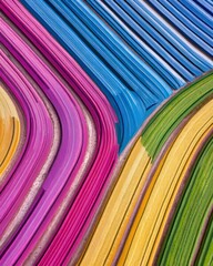 Wall Mural - Colorful, curved lines create an abstract pattern in this image.