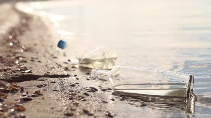 Wall Mural - bottle floating on water. glass and plastic bottle pollutes the river, the concept of recycling garb