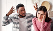 © Prostock-studio - African american husband swears with european wife