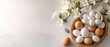 © Wall - A basket holding several eggs next to an empty bowl