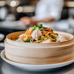 Canvas Print - Steamed dumplings with vegetables and a chef in the background.