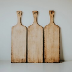 Sticker - Three rustic wooden cutting boards with a white background.