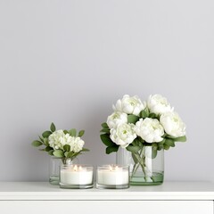 Poster - Three white candles and two vases of white flowers on a white shelf.