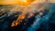 © beldesigne - dramatic wildfire with towering flames and darkened sky