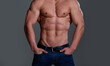 © Volodymyr - Fitness hispanic man bodybuilder with flexing abs and strong body. Seductive male model with strong power muscles. Attractive topless guy. Young sexy man with muscular body. Sexy male model.