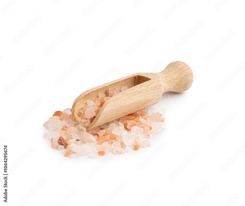 Wooden scoop with pink Himalayan salt on white background