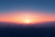 © Suchalitha - Sun rise over city scape just above the horizon, sky colour gradient transitioning from deep blue to light orange and pink, seamless gradient