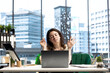 © DC Studio - Young female entrepreneur having fun listening to her favorite music, dancing around in her high end corporate office. Director with executive power multitasking, working and singing.