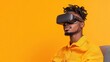 © BOJOShop - Man Experiencing Virtual Reality with Headset on Yellow Background