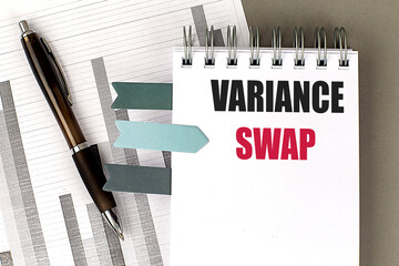 Wall Mural - Variance swap concept with notebook, pen, and financial charts on a desk 