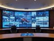 © useful pictures - Modern Control Room Featuring Multiple Display Screens Showcasing Various Activities and Locations With Sleek Furniture and Technology
