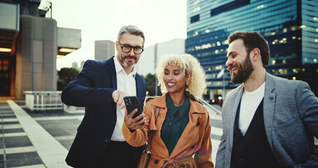 Poster - App launch, city and friends with phone, together for communication, networking or social media. Business, funny or meme with colleague man and woman group outdoor in urban town for humor or joking