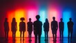 © milenialdesastudio - Silhouettes of diverse people standing in front of a colorful neon light wall.